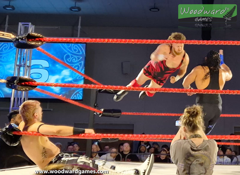 Wrestlers Pat Schisk flying from the ropes into Jaime Tagataese, during the Kiwi Rumble - Aotearoa Wrestling - Woodward Games